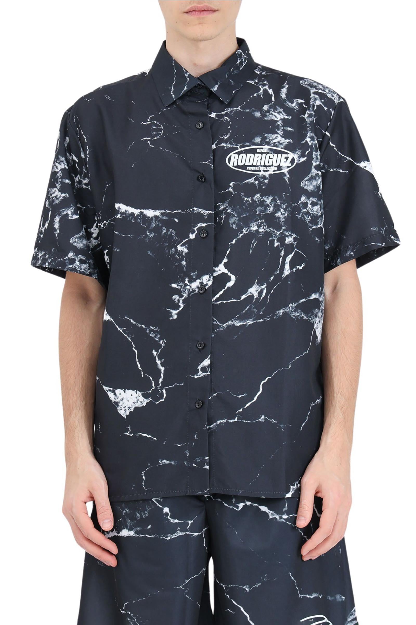 D. RODRIGUEZ shirt